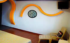 Mira nuestra habitación tropical